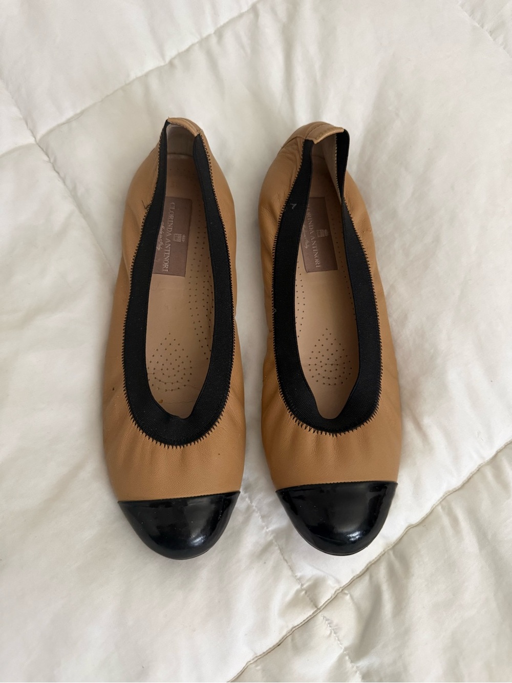 Taryn Rose Two-Tone Cap-Toe Ballet Flats in Tan and Black